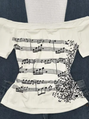 S66aae4c39e1c4bf5b8b9e1bb61af9e96p.webp Women's Retro Off-Shoulder Long-Sleeved Slim-Fit T-Shirt, Adorned With Musical Note Print, Fashionable, Y2K Retro Style, High-Quality