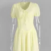 S6bfb77269d67458abc3bae757802bb0dj.webp Tossy Yellow Lace-Up Printed Mini Dress Women's V-Neck Slim Short Sleeve Elegant Commute Bandage Dress Evening Ladies Clothes