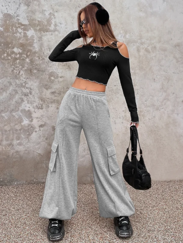 S772caabcb804460bbc5a291fe61c66a2q.webp Summer round-neck off-the-shoulder short T-shirt with spider embroidery fitted long-sleeved top