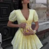 S7ea0eb5d47fb4aaea0de91868d43a9c6y.webp Tossy Yellow Lace-Up Printed Mini Dress Women's V-Neck Slim Short Sleeve Elegant Commute Bandage Dress Evening Ladies Clothes