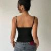 S8590f6c8da144813a82aa52d36c965304.webp Women's Sexy Lace Trim U-Neck Basic Solid Color Slim Fit Cami Top Casual Spaghetti Straps Backless Crop Top Spring/Summer 2026