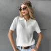 S908aa4c79809410992f2da8d489afc5c1.webp Typhaland Hollow Knitted T shirt Woman 2026 Summer New Short Sleeve Casual Loose Lapel Ins Hot Tops Lady Sweater T shirt Solid