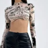 Sdedbc7bb6e6849d2b648d8ced44d27d0B.webp Women's Pattern Printed Semi Stand Collar Long Sleeve T-Shirt Spring Summer New Hot Selling Exposed Navel Top for Ladies