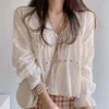 Se5b405a60169401d89b17fe3071a0c8dr.webp Women Fashion V-neck White Women Blouse Spring Flower Loose Hollow Shirt Korean Elegant Sweet Long Sleeve Short Tops Blusas