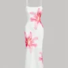 Sef2485be0bae412ca3909c96171569b3o.webp Elegant floral print sundress, resort-style dress